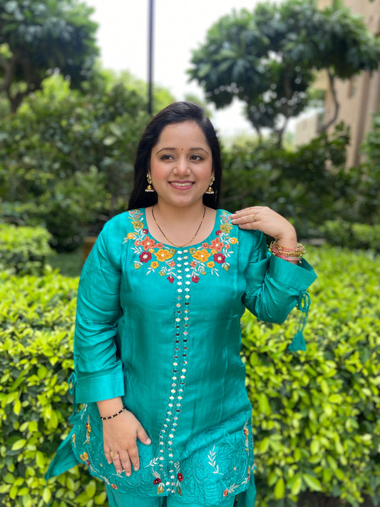 Kasumbi Firadaus Teal